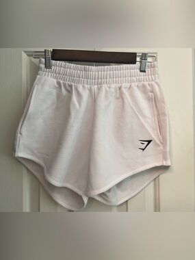Gymshark White Women's Athletic Shorts with Elastic Waistband.